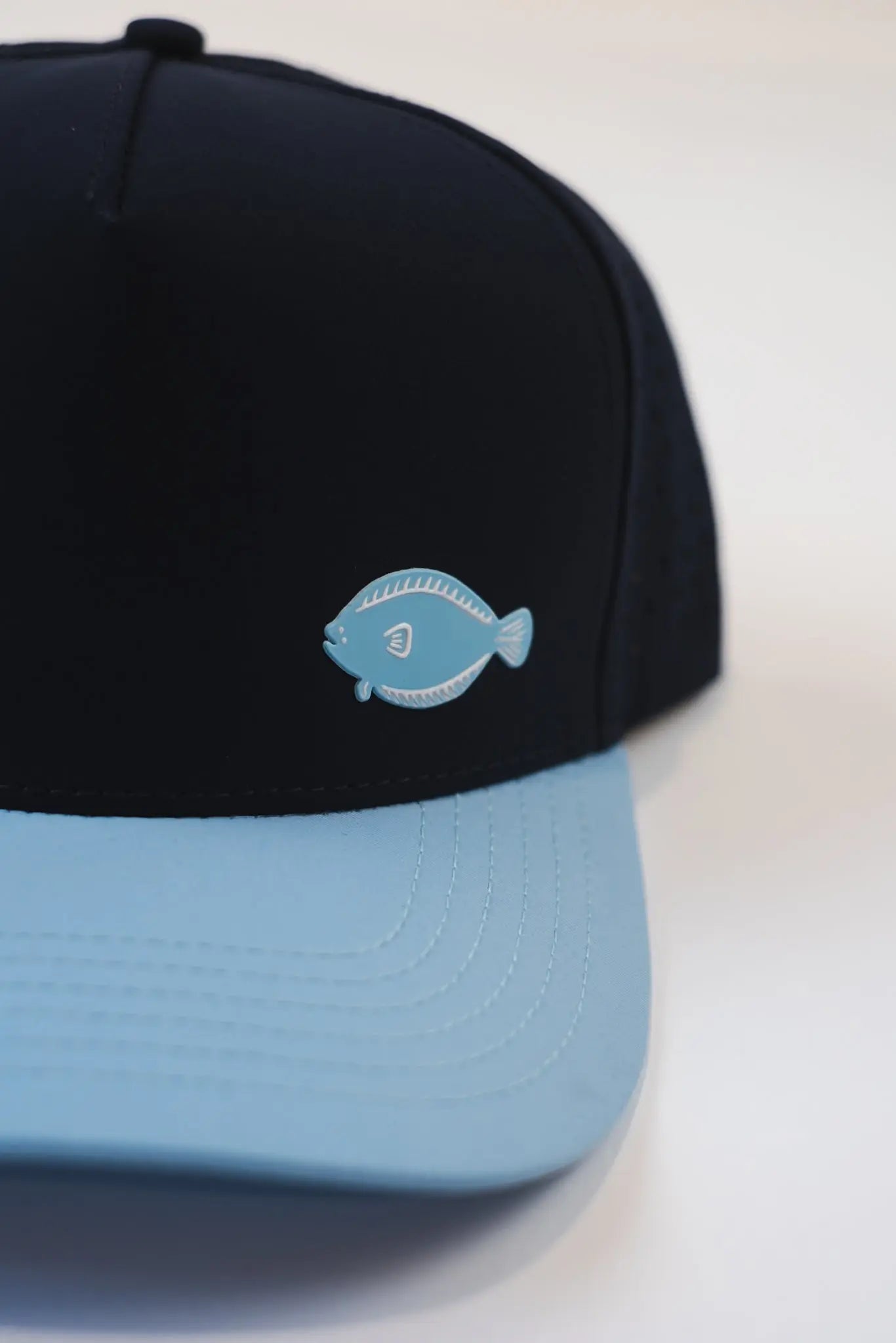 Left Fin MagnoliaCottonCo. Hats 35.00 MagnoliaCottonCo. Navy/Blue Sky